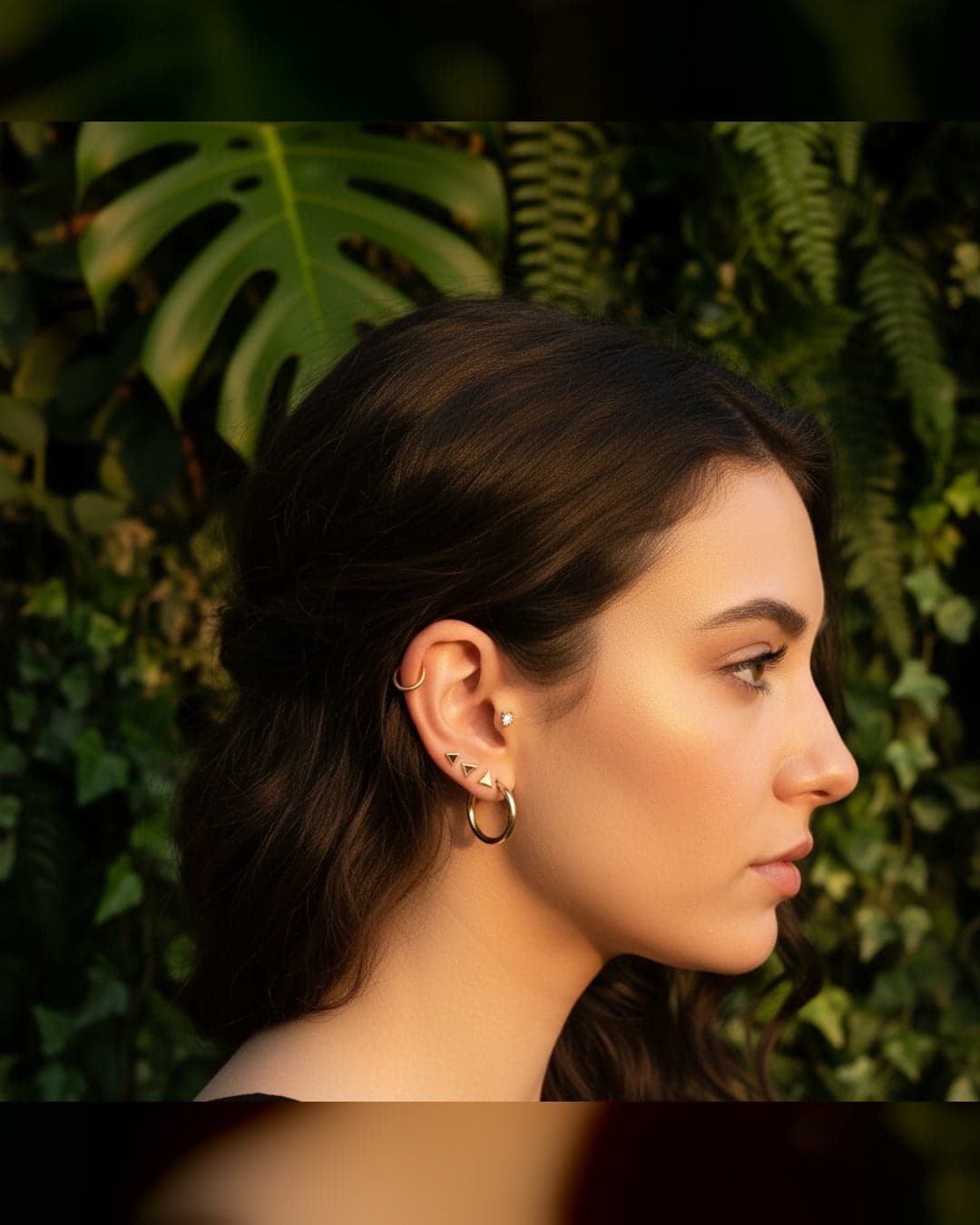 Ear curation met meerdere piercings — Piercing Den Haag